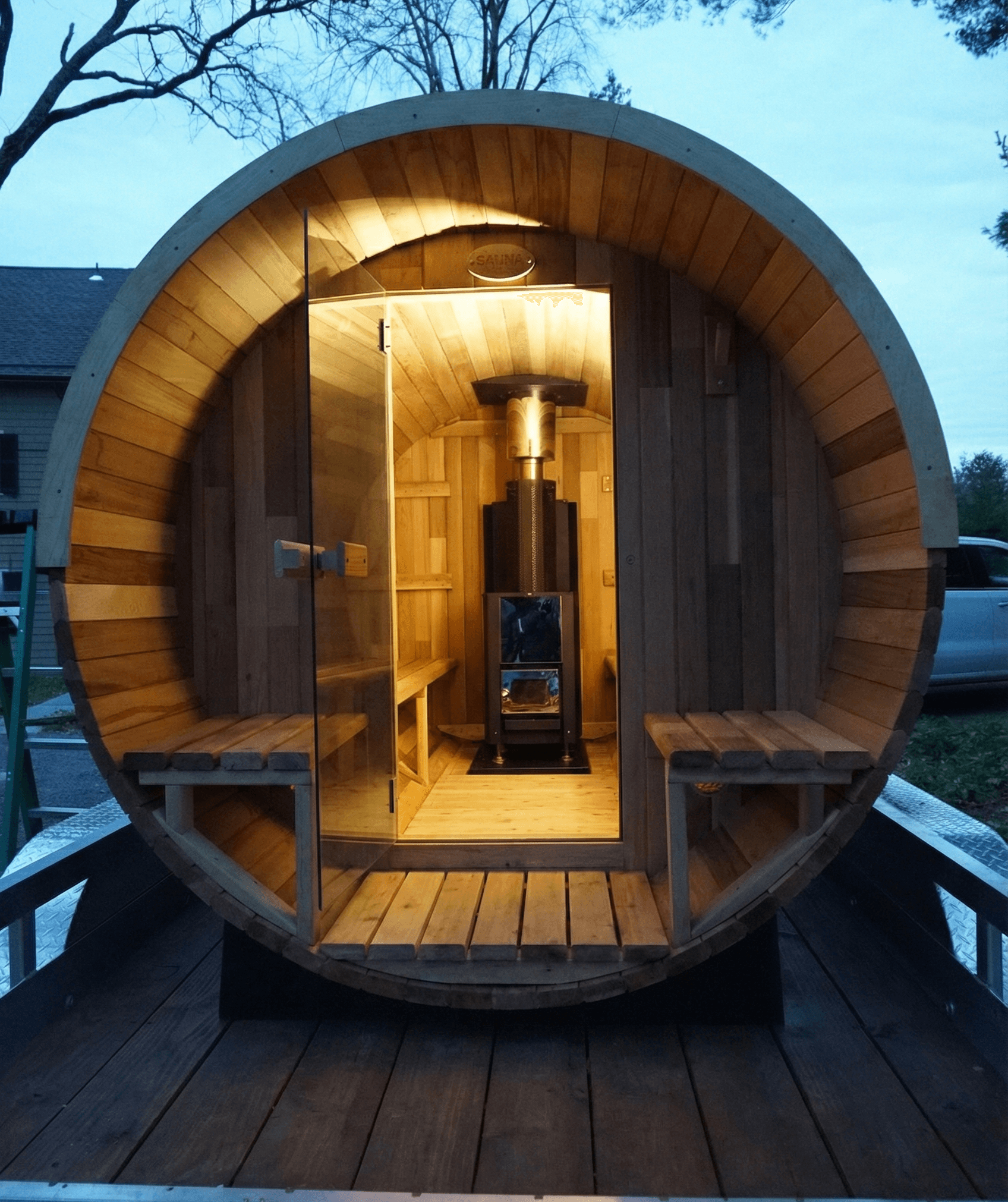 Couple legs in sauna with bucket